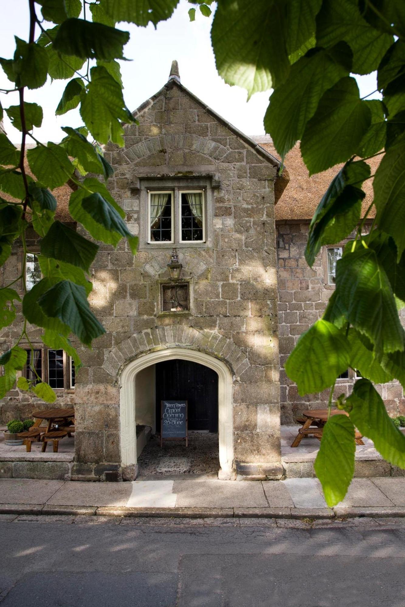 The Three Crowns Hotell Chagford Exteriör bild The entrance to the museum