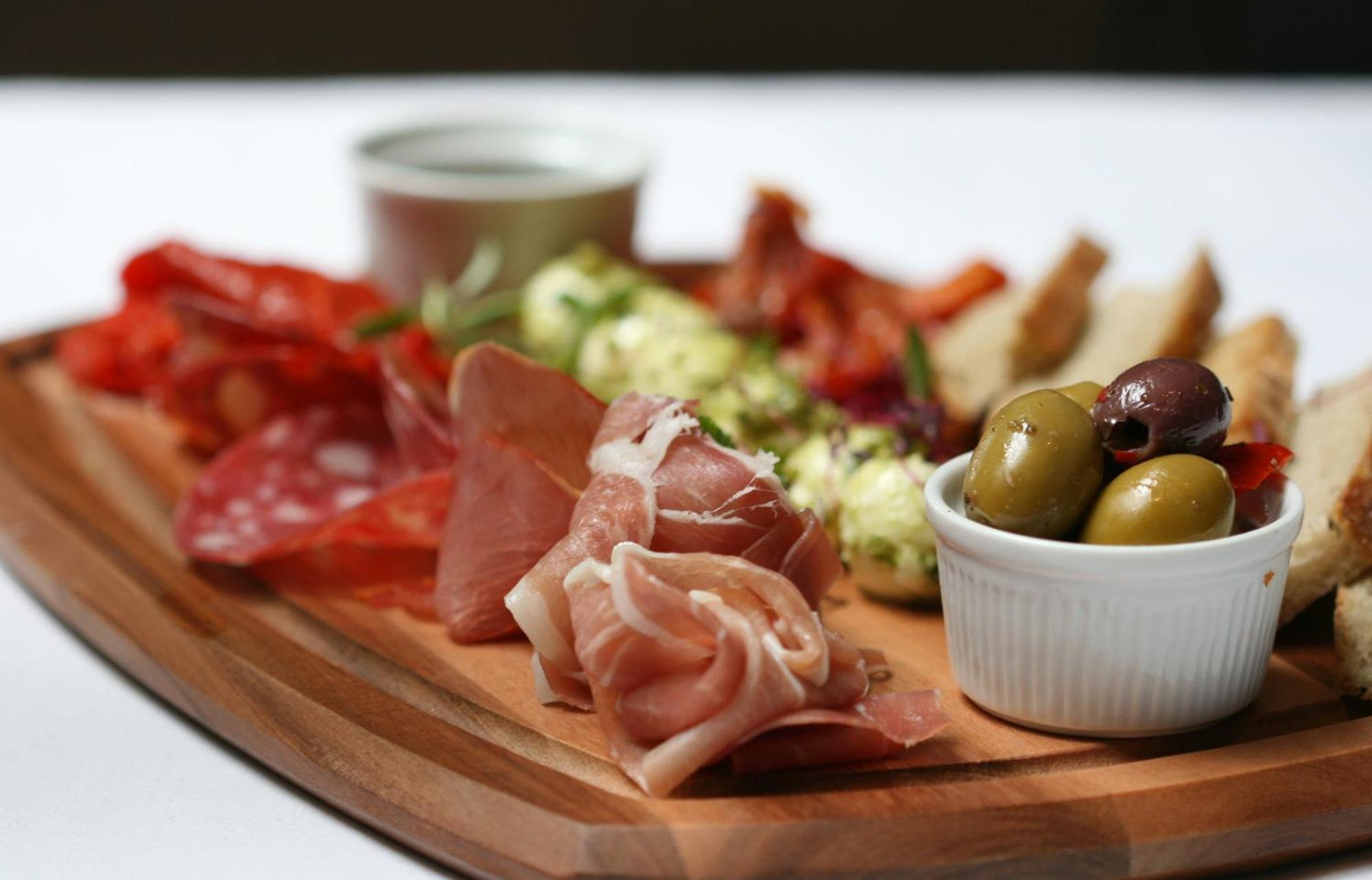 The Three Crowns Hotell Chagford Exteriör bild A selection of cured meats