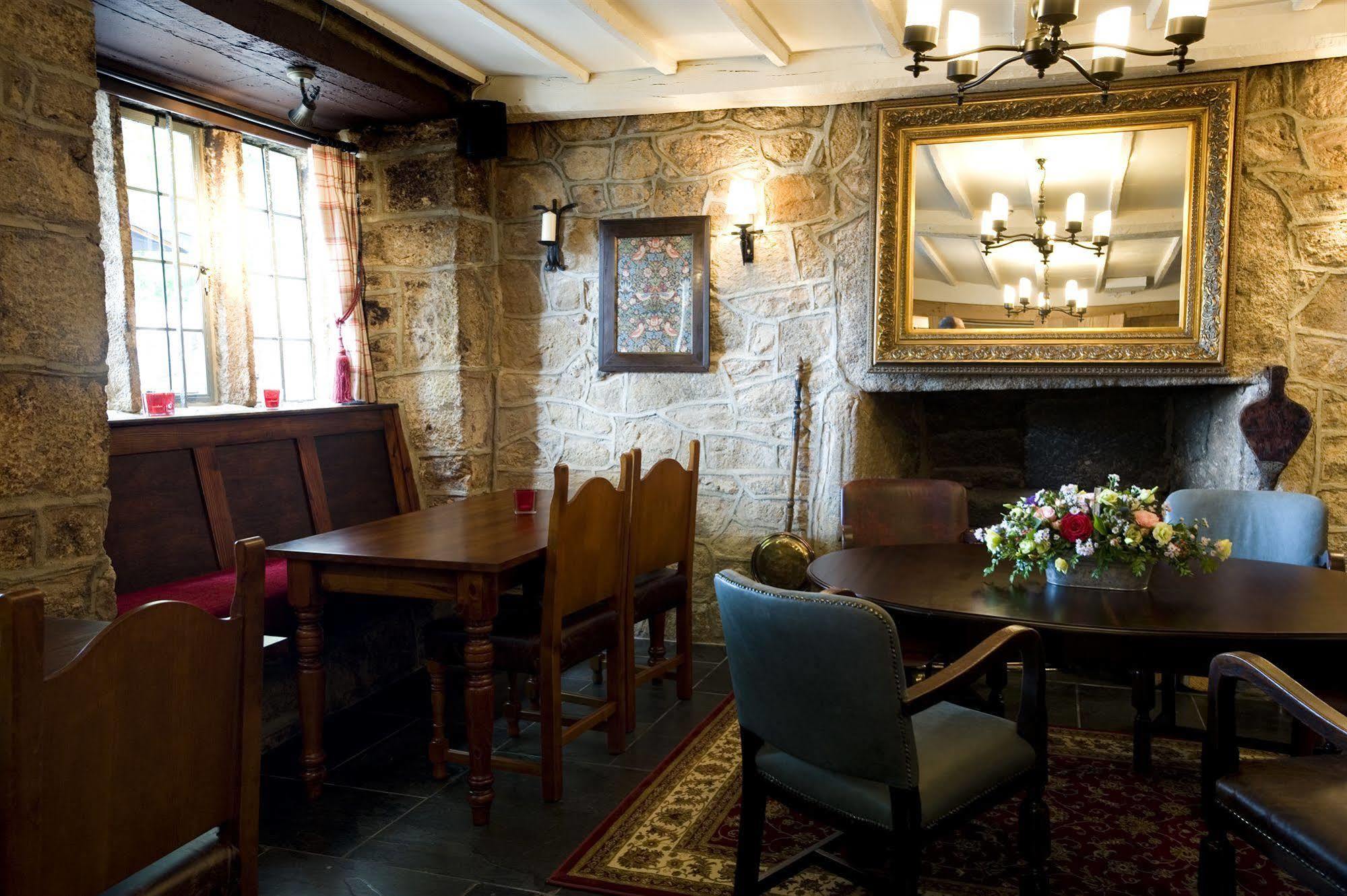 The Three Crowns Hotell Chagford Exteriör bild The interior of the pub